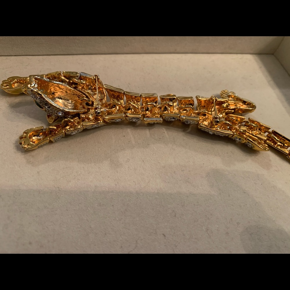 Faceted Austrian crystal adorned Panther Brooch.